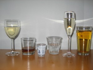 Image 4: Standard Drink Sizes. L to R: 5 ounces of wine, 1.5 ounce of bourbon straight up, 1.5 ounce shot of vodka, 1.5 ounce of vodka on the rocks, 3.3 ounces of Champagne and 12 ounces of regular beer. Courtesy: Jessica Scott