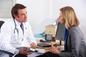 American doctor talking to businesswoman patient Alcohol Abuse Going On in the Family? - If Only My Doctor Had Asked